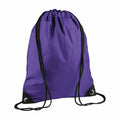 The BG010 by Bagbase is a purple drawstring backpack with black strings, designed with reinforced corners and metal eyelets.