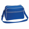 A Bagbase BG014 shoulder bag in blue, featuring white piping and a front zippered pocket.