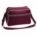 The Bagbase BG014 is a maroon shoulder bag featuring white accents and a front zipper pocket.