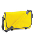 Introducing the BG021 from Bagbase: a vibrant yellow messenger bag featuring a gray adjustable shoulder strap, flap closure, and sleek black trim along the edges.