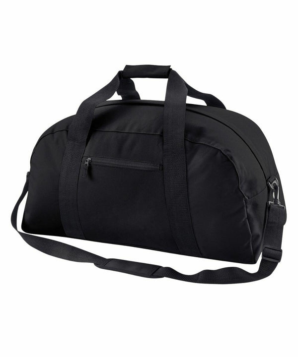 A Bagbase BG022 with a large main compartment, a front zippered pocket, two sturdy handles, and an adjustable shoulder strap. The simple and sleek design is ideal for travel or gym use.