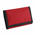 BG040 red fabric wallet by Bagbase with black trim, closed and lying flat on a plain white background.