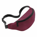 Bagbase's BG042 features a maroon design with a black adjustable strap and zipper closure.