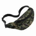 The Bagbase BG042 fanny pack, featuring a camouflage pattern in shades of green, brown, and black, comes with a black adjustable strap and a zipper closure.