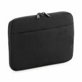 The BG065 by Bagbase is a black zippered tablet or laptop sleeve featuring a front pocket, displayed against a white background.