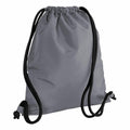 A Bagbase BG110 backpack featuring a gray design with black drawstring cords and a convenient side zippered pocket.