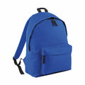 Introducing the Bagbase BG125, a vibrant blue backpack featuring a spacious main compartment and a convenient front zippered pocket. This backpack is equipped with black adjustable shoulder straps and a top handle for easy carrying. The black zippers seamlessly complement the backpack's minimalist and practical design.
