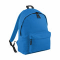 Introducing the Bagbase BG125, a vibrant blue backpack featuring sleek black zippers and adjustable straps. It boasts a spacious main compartment along with a convenient front pocket for extra storage, designed with simplicity and functionality that makes it perfect for everyday use.