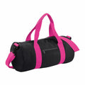 The BG140 by Bagbase is a black cylindrical duffel bag featuring vibrant pink straps and a small zippered side pocket.
