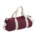 The Bagbase BG140 is a maroon duffel bag that includes beige straps and features a front zipper pocket. It comes with dual handles and an adjustable shoulder strap, offering versatile carrying options.
