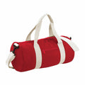 The BG140 from Bagbase is a cylindrical duffel bag in red with beige straps and handles. It includes a front zipper pocket, an adjustable shoulder strap, and is perfect for carrying gym or travel essentials.