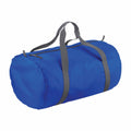 The Bagbase BG150 is a cylindrical blue duffel bag featuring gray handles and a black zipper. Crafted from fabric, its handles are attached at the top for convenient carrying.