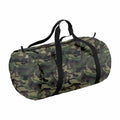 The BG150 duffel bag by Bagbase features a green and brown camouflage pattern with black handles.