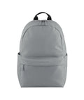 The Bags rucksack is light grey with a front zip pocket, two side pockets, and a black top handle, displayed on a white background.