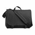 The Bagbase BG218 is a black messenger bag equipped with both a shoulder strap and handle, featuring a front flap secured by two buckle closures.