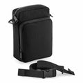 Bagbase's BG241 is a black fabric crossbody bag featuring two zippered compartments and an adjustable strap.