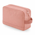 Bagbase BG277, a pink rectangular toiletry bag featuring a zippered top and a side handle.