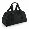 A Bagbase BG278 featuring a black design with two straps and a zippered main compartment.