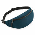 The Bagbase BG282, a teal fanny pack featuring a black adjustable strap and zipper closure, is set against a plain white background.