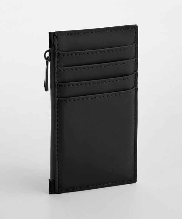 A sleek black leather card holder with multiple card slots and a zippered pocket on the side. The BG326 by Bagbase is standing upright against a plain white background.