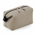 The Bagbase BG330 features a beige design with a black zipper and a looped pull tab.
