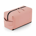 A pink rectangular Bagbase toiletry bag (BG332) featuring a black zipper and a side handle.