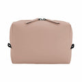 The BG334 toiletry bag by Bagbase is beige in color, features a rectangular shape, and comes with a top zipper and small black loops on the sides.