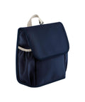 A "Bags" lunch bag in navy blue fabric features a front flap, side pocket, and beige handle, shown against a white background.