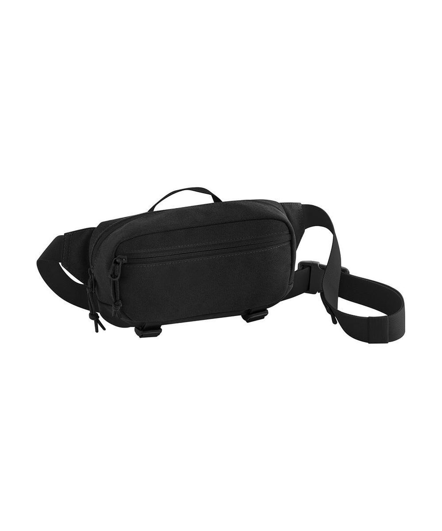 The Bags black waist bag features a zippered front pocket, adjustable strap, and a small top handle, shown against a white background.