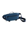 Bags bum bag in blue with a zippered main compartment, front zip pocket, adjustable strap, and top handle, shown on a white background.
