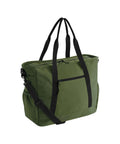 Bags in green with black handles, a black adjustable shoulder strap, front zipped pocket, and main zip fastening are displayed on a white background.