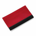 The BG485 by Bagbase, a fabric wallet in red with a black edge, is displayed against a white background.