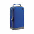 Introducing the BG540 by Bagbase, a blue and gray zippered bag featuring a rectangular design, convenient handle, and a small circular opening near the top.