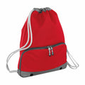 Introducing the BG542 by Bagbase: A red drawstring backpack featuring sleek gray trim and white cords. It is equipped with a convenient zippered front pocket and black grommets at the corners for added durability.