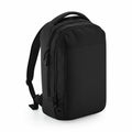 The BG545 by Bagbase is a sleek, modern backpack in black with black accents. It boasts a rectangular design with multiple zippered compartments and padded shoulder straps, combining minimalist style with functionality. Ideal for daily use or travel.