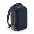 Introducing the BG545 from Bagbase: A stylish dark blue backpack accented with gray detailing, offering multiple compartments. It features a convenient top handle, padded shoulder straps for comfort, a front-facing zipper, and a built-in USB port on the side.