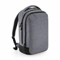 The BG545 by Bagbase is a sleek, modern backpack in gray with black accents. It boasts a rectangular design with multiple zippered compartments and padded shoulder straps, combining minimalist style with functionality. Ideal for daily use or travel.
