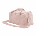 A Bagbase BG560 duffel bag in light pink, featuring multiple pockets and an adjustable shoulder strap.