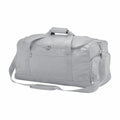 Introducing the Bagbase BG562: a stylish gray duffel bag equipped with a convenient shoulder strap and sturdy top handles. It includes a front zipper pocket for easy access and additional side pockets with zippers for extra storage.