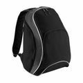 Introducing the Bagbase BG571, a stylish black backpack featuring white accents and multiple zippered compartments.