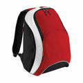 Introducing the Bagbase BG571 backpack in a striking red and black color scheme. It boasts a spacious front pocket, zippered compartments, and stylish white accents running along the sides. Designed with adjustable padded shoulder straps, it ensures comfort for all-day wear.