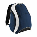 Introducing the BG571 by Bagbase: a stylish backpack featuring a blue and black design with a sleek white stripe, equipped with multiple zippered compartments, padded shoulder straps, and a convenient short handle on top.