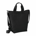 The BG673 by Bagbase is a black tote bag featuring short handles and a long adjustable shoulder strap, showcased upright against a plain background.