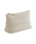 A beige quilted zip-fastened bag with horizontal stitching stands upright on a white background.