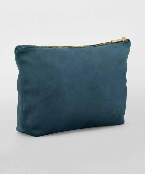 A teal zippered pouch standing upright against a plain white background. The pouch, BG714 from Bagbase, has a minimalist design with a smooth texture and a gold-colored zipper at the top.