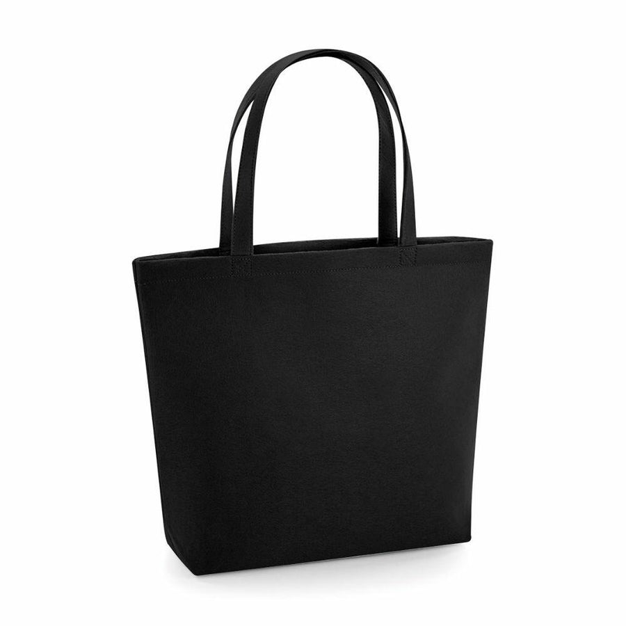 A Bagbase BG721, a plain black tote bag with two handles, is set against a white background.