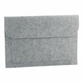 A Bagbase BG726 gray felt envelope featuring a flap closure set against a white background.