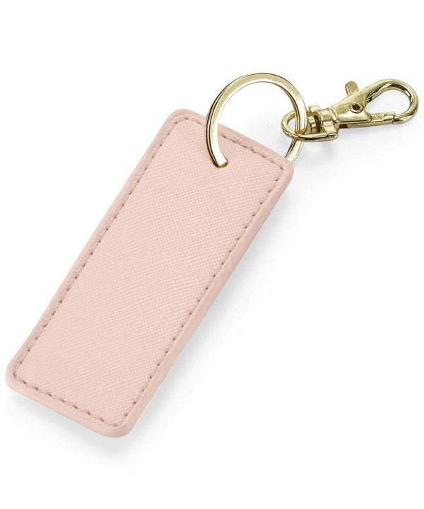 A rectangular pink leather keychain with a gold keyring and a gold clasp clip. The Bagbase BG744 features stitching along the edges.