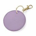 The BG745 from Bagbase features a round, lavender design with a gold clasp and ring, set against a white background.