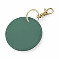 A Bagbase BG745 round keychain in green, featuring a gold-tone metal ring and clasp.